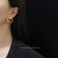 Special-shaped Cochlear Inspiration Steel Material Plated 18k Real Gold Earrings Wholesale main image 5
