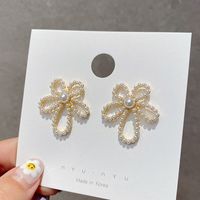 925 Silver Needle Fashion Baroque Pearl Peach Blossom Five Petal Flower Wild Earrings For Women main image 1