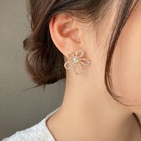 925 Silver Needle Fashion Baroque Pearl Peach Blossom Five Petal Flower Wild Earrings For Women main image 4
