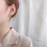 925 Silver Needle Asymmetric Love Pearl Small And Simple Earrings For Women main image 3