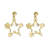 Korea's Exquisite Star S925 Silver Needle Alloy Inlaid Pearl Flower Earrings Wholesale sku image 1