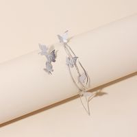 Koreanische Verspielte Und Niedliche Schmetterlings Asymmetrische Ohrringe Weibliche Trend Ige Ins Netto-promi-temperament Lange Schmetterlings-quaste Ohrschmuck main image 4