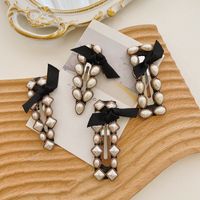 Pearl Bow Knot Korean Fashion Alloy Hair Clip Back Head Hairpin Women's Side Clip Wholesale main image 1