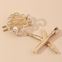 New Beach Hairpin Holiday Golden Starfish Pearl Hollow Small Shell Hairpin Side Clip Wholesale Nihaojewelry main image 4