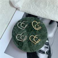 Korean S925 Silver Needle Double Gap Peach Heart Simple Girl Retro Earrings For Women main image 4