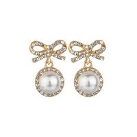 S925 Silbernadel Korea Süße Und Süße Fairy Fashion Bogen Perle Legierung Ohrringe Großhandel main image 6
