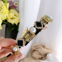 Design Druna Hotel Retro Court European Style Rhinestone Metal Three-dimensional Butterfly Pearl Headband Hair Band main image 5