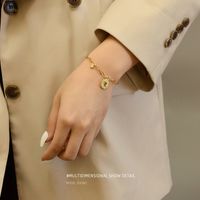 Niche Fashion Round Brand Pendant Titanium Steel Plating 18k Hypoallergenic Bracelet For Women Jewelry main image 3