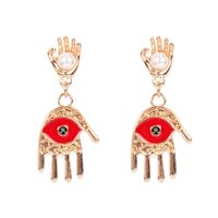 Retro Alloy Inlaid Pearl Red Eyes Palm Fashion Earrings Wholesale sku image 1