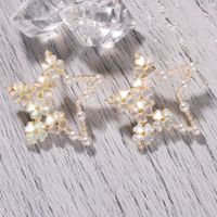 Korea Alloy Inlaid Pearl Fashion Love Five-pointed Star Earrings Wholesale main image 5