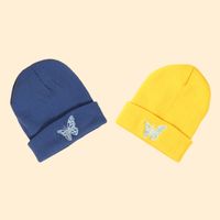 Hot Selling Fashion Pure Color Knitted Embroidery Butterfly Warm Woolen Hat Wholesale main image 4