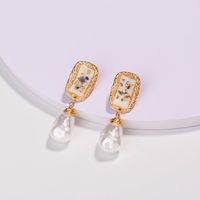 European And American Fashion Popular Ornament White Dripping Oil Color Shell Ear Hook Hand-woven Pure White Pearl Earrings main image 1