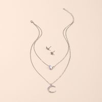 Vente Chaude Mode Étoile Lune Collier Multicouche Boucles D&#39;oreilles Mis En Gros main image 5