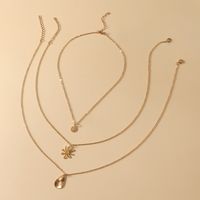 Mode Mehrschichtige Legierung Hohle Tropfenförmige Blume Einfache Retro 3-teilige Halskette sku image 1