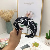 Korea New Simple Fashionable Alphabet Fabric Bilateral Hit Color Middle Knot Wide Side Hairband For Women main image 4