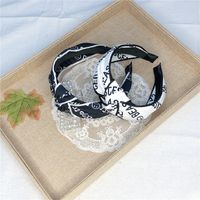 Korea New Simple Fashionable Alphabet Fabric Bilateral Hit Color Middle Knot Wide Side Hairband For Women main image 5