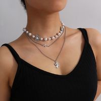 Fashion  Butterfly Pendant Clavicle Necklace Personalized Simple Pearl Cross Necklace main image 4