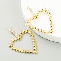 Exaggerated Golden Heart-shaped Alloy Inlaid Rhinestones S925 Silver Needle Fashion All-match Earrings Wholesale main image 3
