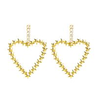 Exaggerated Golden Heart-shaped Alloy Inlaid Rhinestones S925 Silver Needle Fashion All-match Earrings Wholesale sku image 1