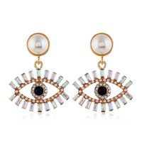 Fashion Exaggerated Devil's Eye Pearl Alloy Inlaid Colored Diamonds Earrings Wholesale main image 6