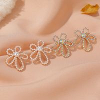 S925 Silver Needle Pearl Flower Simple Sweet Gradient Hollow Flower Boucles D&#39;oreilles main image 1