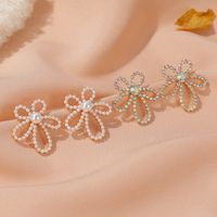 S925 Silver Needle  Pearl Flower Simple  Sweet Gradient Hollow Flower Stud Earrings main image 1