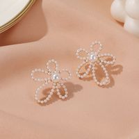 S925 Silver Needle  Pearl Flower Simple  Sweet Gradient Hollow Flower Stud Earrings sku image 2