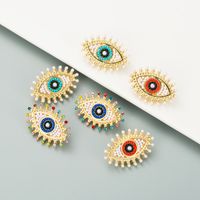 Retro Devil's Eye Alloy Inlaid Pearl Rhinestone Earrings main image 1