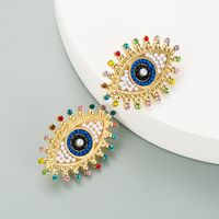 Retro Devil's Eye Alloy Inlaid Pearl Rhinestone Earrings main image 3