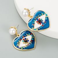 Fashion Heart-shaped Demon Eyes Imitation Pearl Earrings main image 4