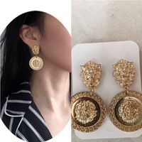 Simple Embossed Lion Head Metal Earrings main image 1