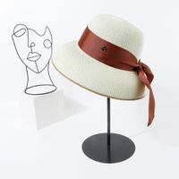 الأزياء الكلاسيكية الفرنسية شقة أعلى الشاطئ القش قبعة المرأة وعاء غطاء مع القوس عقدة الشمس قبعة Nihaojewelry sku image 1