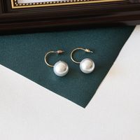 White Big Pearl C-shaped Simple Earrings main image 2