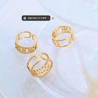 2021 New Open Non-adjustable Letter Hollow Ring Titanium Steel Plated 18k Real Gold Tail Ring main image 6