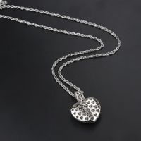 New Heart-shaped Diamond Necklace Female Stock Direct Supply Simple Titanium Steel Rotatable Hollow Love Pendant main image 5
