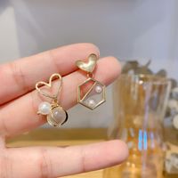 Fashion Big Asymmetric Love Pearl Earrings S925 Silver Needle Personality Earrings Wholesale main image 2