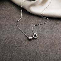New Heart Pendant Clavicle Chain Creative Simple Trendy Hollow Peach Heart Necklace Wholesale main image 1