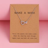 New Heart Pendant Clavicle Chain Creative Simple Trendy Hollow Peach Heart Necklace Wholesale main image 4