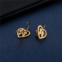 Stainless Steel Earrings Wholesale Love Lovers Hollow Gold Ear Clip Simple Heart-shaped Boys And Girls Kissing Earrings main image 5