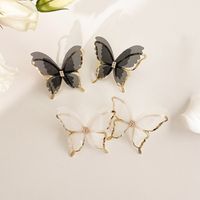 Boucles D&#39;oreilles Papillon Noir Et Blanc Design En Tulle Rétro main image 1