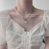 Titanium Steel Love Pearl Ot Buckle Necklace Simple Asymmetric Splicing Clavicle Chain main image 5