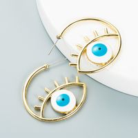 Boucles D&#39;oreilles En Forme De C Avec Gouttes Pour Les Yeux Du Diable Exagérées main image 5