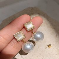 Boucles D&#39;oreilles Rétro En Perles D&#39;oeil De Chat Blanc En Zirconium De Corée main image 3