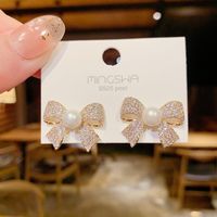Korean Micro-inlaid Bow Stud Earrings Female Exaggerated Pearl Earrings Wholesale sku image 1
