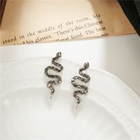 European And American Diamond-studded Snake-shaped Earrings Geometric Metal Zodiac Snake Element Earrings main image 1