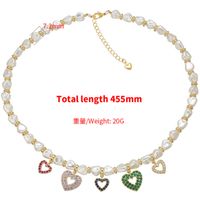 Micro-inlaid Peach Heart Pearl Necklace Colored Diamond Hollow Heart-shaped Pendant Copper Necklace main image 4