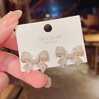 Korean Micro-inlaid Bow Stud Earrings Female Exaggerated Pearl Earrings Wholesale main image 1
