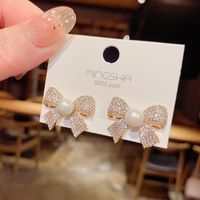 Korean Micro-inlaid Bow Stud Earrings Female Exaggerated Pearl Earrings Wholesale main image 5