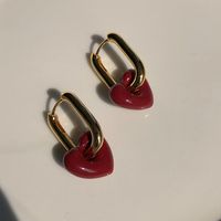 2021 New Metal Texture Red Bean Color Light Luxury French Retro Red Heart Ear Buckle Wholesale main image 1