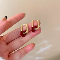2021 New Metal Texture Red Bean Color Light Luxury French Retro Red Heart Ear Buckle Wholesale main image 3